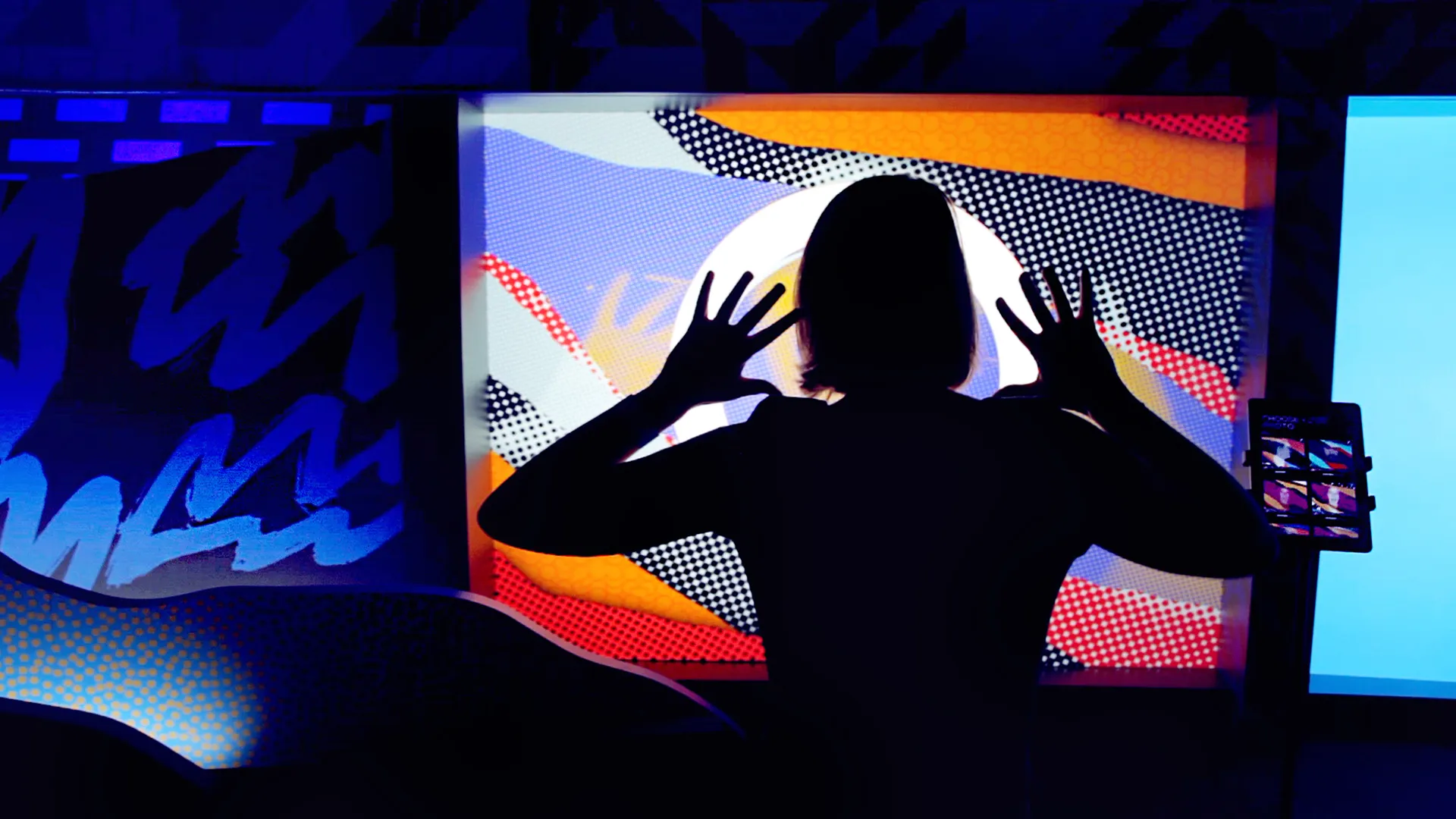 person uses hand motion to rip through content on screen